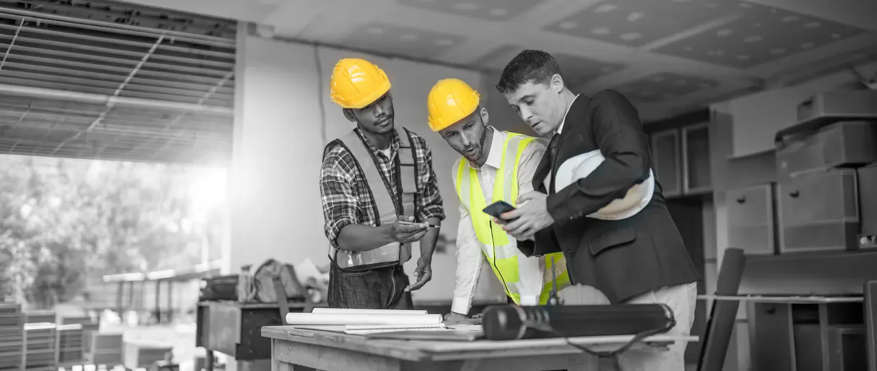 An engineer trying his firm's own branded app on site