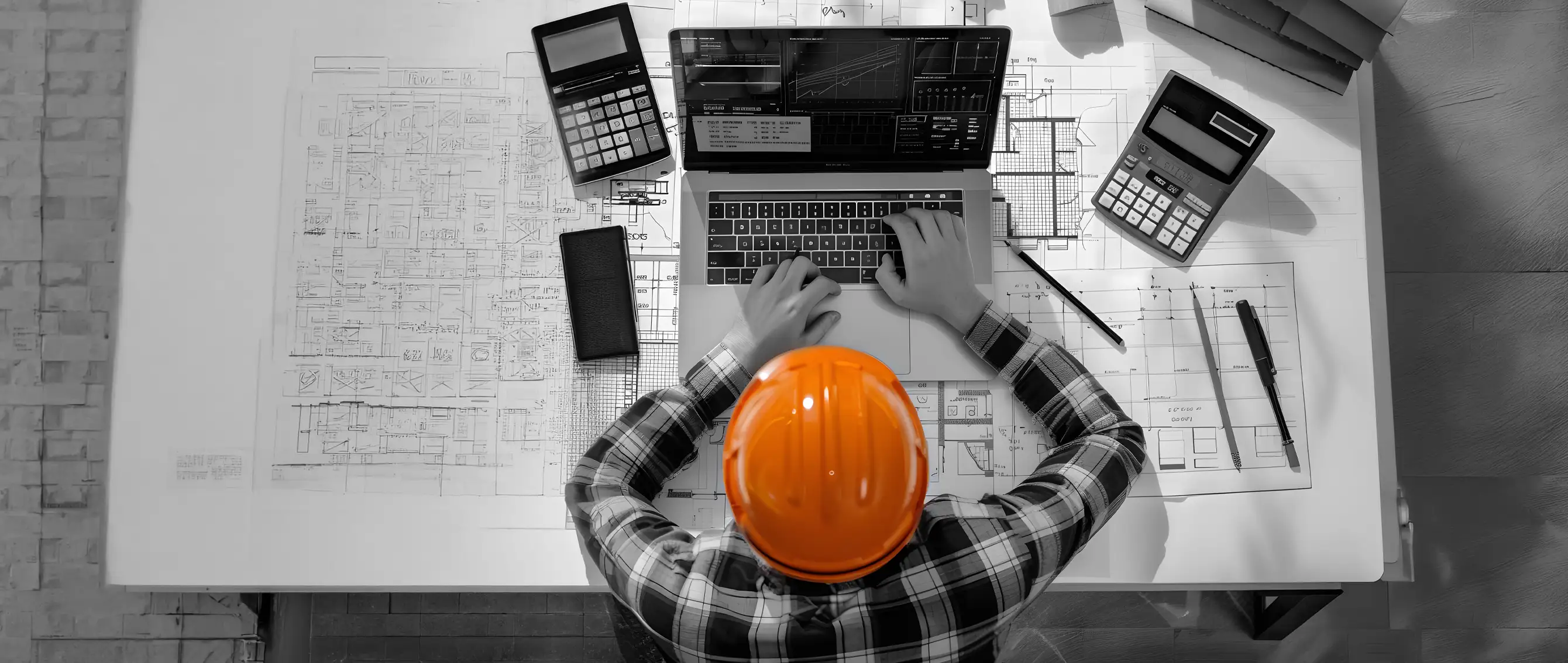 Estimator bringing a price workbook to a Unibuild pricing review