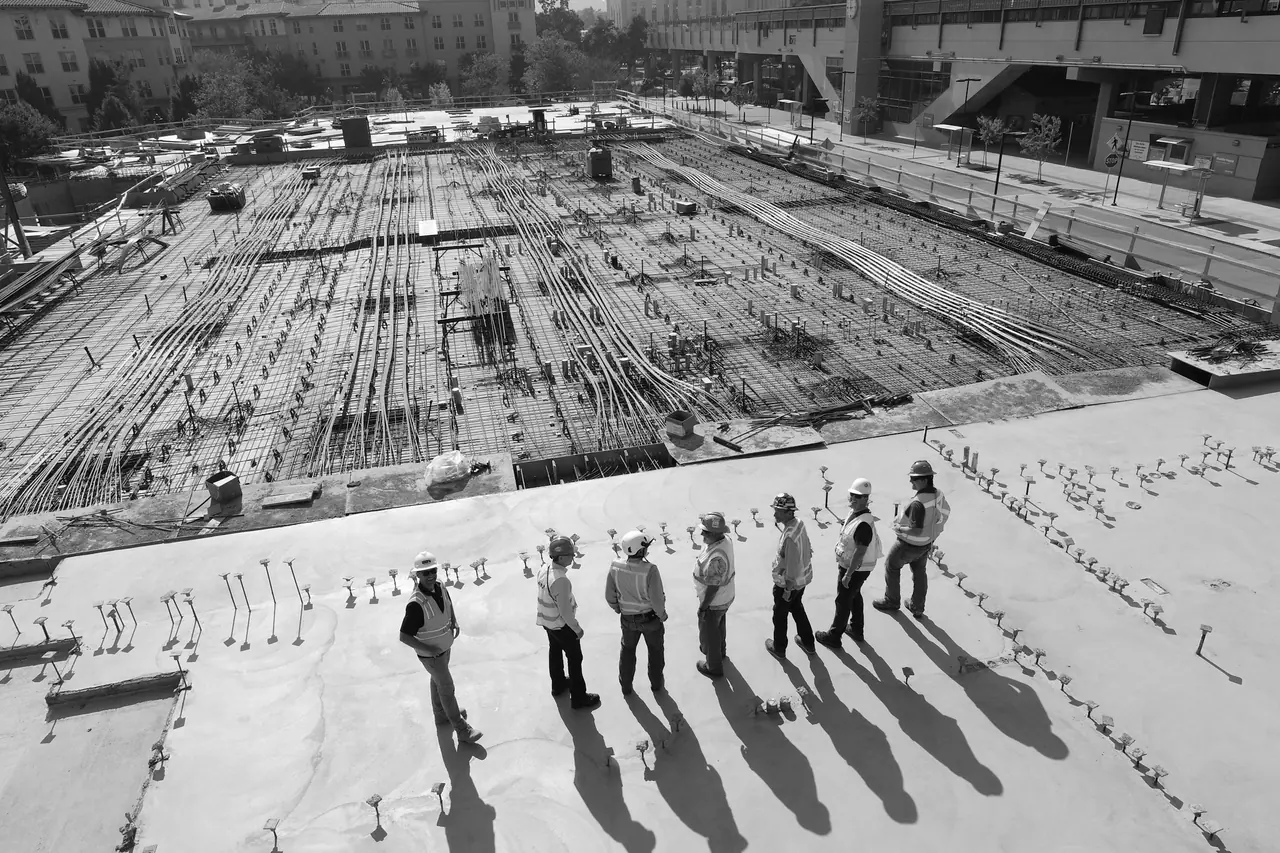 Construction operatives on a UK site in hi-vis