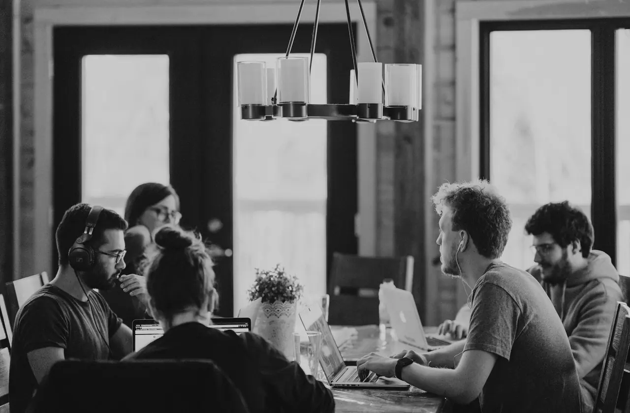 A team working together at a shared table