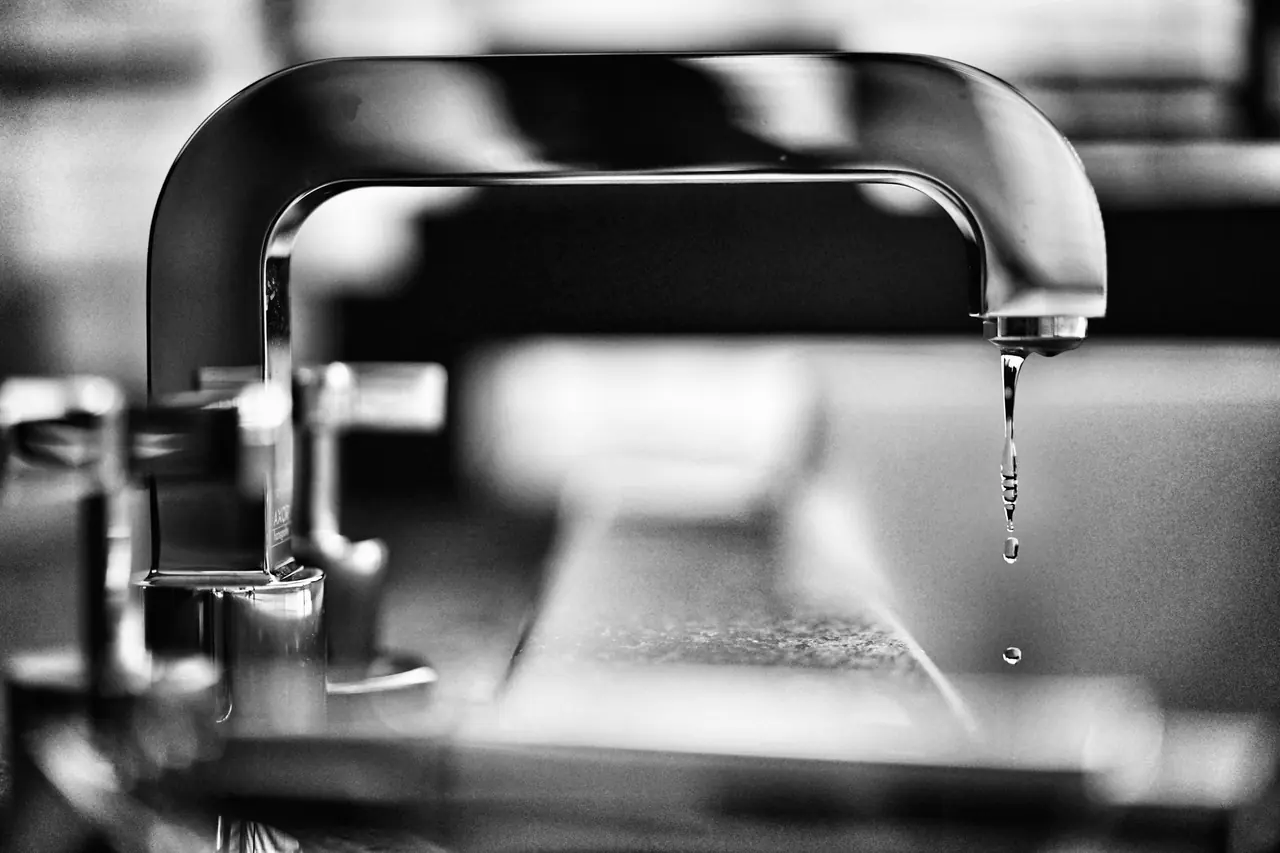 Water running from a chrome tap